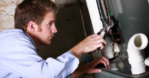 Paul, one of our Leesburg water heater repair experts is fixing an unit